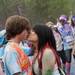 Color Run participants kiss near the finish line on Saturday, May 11. Daniel Brenner I AnnArbor.com